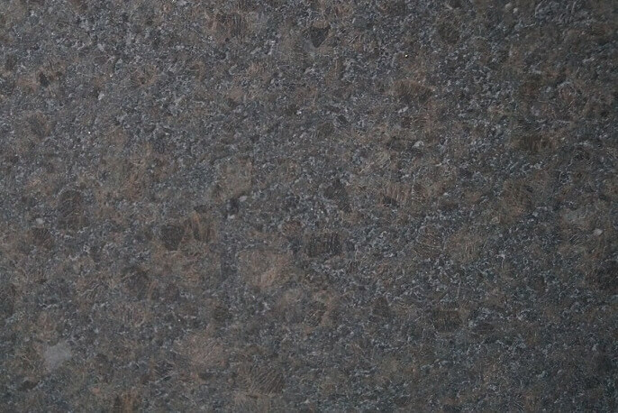 Natuursteen vloertegels - Coffee Brown Graniet - Leather Finish (Binnen)